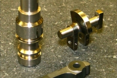 Shafts, levers, and clutch details made from stainless steel and used as engine components